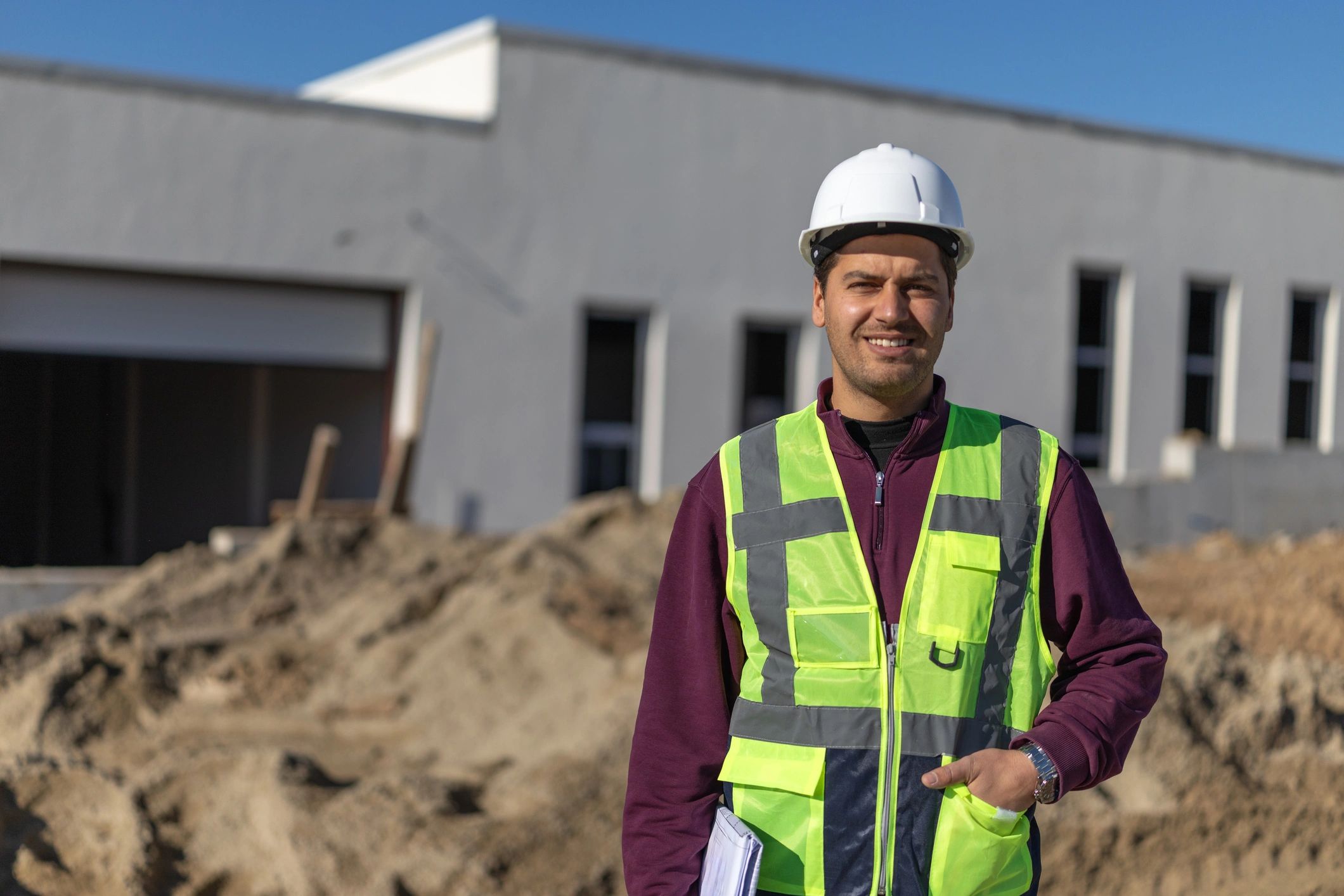 Construction professional managing project delivery